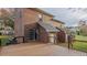 Exterior view of the home with a wood deck at 208B Mallard Creek Dr, Graham, NC 27253