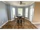 Dining area with a table, chairs, tile floor, and natural light at 208B Mallard Creek Dr, Graham, NC 27253