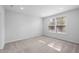 Bedroom with neutral carpet, recessed lighting and large window at 2328 Beeblossom Pl, Fuquay Varina, NC 27526