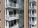 A close up view of the building's exterior featuring multiple balconies with seating areas at 2402 Environ Way # Bldg 2000, Chapel Hill, NC 27517