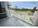 Enjoy views of the golf course from this condo's private balcony with modern, white metal railings at 2402 Environ Way # Bldg 2000, Chapel Hill, NC 27517