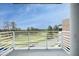 This unit's balcony boasts golf course views, modern railings, and ample space at 2402 Environ Way # Bldg 2000, Chapel Hill, NC 27517