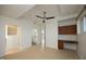 Open bedroom view showing a walk-in closet, ensuite bathroom, built-in workspace, and plenty of natural light at 2402 Environ Way # Bldg 2000, Chapel Hill, NC 27517