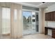 Bedroom with hardwood floors and sliding glass door to balcony at 2402 Environ Way # Bldg 2000, Chapel Hill, NC 27517