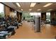 Well-equipped fitness center with modern machines and large windows offering scenic views at 2402 Environ Way # Bldg 2000, Chapel Hill, NC 27517