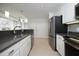 Bright kitchen with stainless steel appliances and modern gray countertops at 2402 Environ Way # Bldg 2000, Chapel Hill, NC 27517