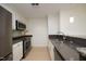 Modern kitchen with stainless steel appliances, sleek countertops, and ample storage at 2402 Environ Way # Bldg 2000, Chapel Hill, NC 27517