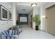 Inviting lobby area with comfortable seating, artwork, and an elevator bank for easy access to units at 2402 Environ Way # Bldg 2000, Chapel Hill, NC 27517