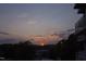A serene view of the sun setting over a wooded landscape at 2402 Environ Way # Bldg 2000, Chapel Hill, NC 27517