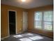 Cozy bedroom with bright natural light and an adjoining bathroom at 2416 Fields Of Broadlands Dr, Raleigh, NC 27604