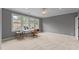 Spacious bedroom area with carpet, crown molding and large windows offering lots of natural light at 255 Capellan St, Wake Forest, NC 27587