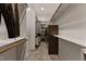 Spacious walk-in closet with custom shelving, ample storage space, and neutral carpeting at 255 Capellan St, Wake Forest, NC 27587