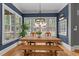 Bright dining room featuring a wooden table with views of the backyard at 255 Capellan St, Wake Forest, NC 27587