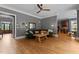 A spacious living room with hardwood floors, a fireplace, and french doors at 255 Capellan St, Wake Forest, NC 27587