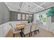 Elegant dining room featuring coffered ceilings, a modern chandelier, and neutral decor at 257 Reese Dr, Willow Springs, NC 27592