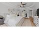 Relaxing main bedroom featuring neutral tones, soft textures, and stylish decor at 257 Reese Dr, Willow Springs, NC 27592