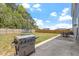 A home's backyard features a grill, fenced in yard, patio and view of the sky at 30 Dowdy Ct, Youngsville, NC 27596
