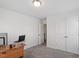 Functional bedroom or office space with carpet floors, neutral paint, and closet at 30 Dowdy Ct, Youngsville, NC 27596
