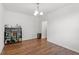 Bright, open space with hardwood floors and a decorative light fixture at 30 Dowdy Ct, Youngsville, NC 27596