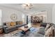 Open-concept living space offers a seamless flow to the kitchen and dining area at 30 Dowdy Ct, Youngsville, NC 27596