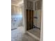 Bathroom featuring shower stall with built-in bench and white shaker vanity with double sink and chrome hardware at 329 Green Pines Estates Dr, Kenly, NC 27542