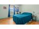 A pleasant bedroom showcases hardwood floors, natural light, and an exercise bike for convenient workouts at 342 Mcleod Rd, Broadway, NC 27505