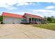 Charming exterior view features a two-car garage, screened porch, and inviting curb appeal at 342 Mcleod Rd, Broadway, NC 27505
