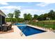 Backyard view of the private pool and patio perfect for entertaining and summer days at 342 Mcleod Rd, Broadway, NC 27505