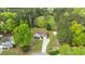 An aerial view displays the home's inviting curb appeal and manicured front yard at 35 Vauxhall Ct, Youngsville, NC 27596