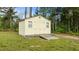 The shed includes a ramp, double doors, and two windows at 35 Vauxhall Ct, Youngsville, NC 27596