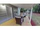 Cozy covered porch with neutral-toned outdoor seating for relaxed entertaining at 3610 Hawkins Ave, Sanford, NC 27330