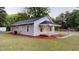 Charming gray home with manicured lawn, small porch, and modern siding at 3610 Hawkins Ave, Sanford, NC 27330