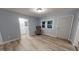 Bright living room with wood floors, and an adjacent bathroom for easy living at 3610 Hawkins Ave, Sanford, NC 27330