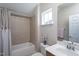 Neutral bathroom featuring shower/tub, single vanity, and ample lighting at 3827 Heritage Spring Circle Cir, Wake Forest, NC 27587