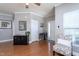 Light-filled foyer boasting hardwood floors, a decorative mirror, and beautiful accent furniture at 3827 Heritage Spring Circle Cir, Wake Forest, NC 27587