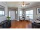 Inviting foyer with hardwood floors, featuring a ceiling fan and ample natural light at 3827 Heritage Spring Circle Cir, Wake Forest, NC 27587