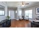 Inviting living room with hardwood floors, a ceiling fan, and lots of natural light at 3827 Heritage Spring Circle Cir, Wake Forest, NC 27587