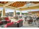 Inviting outdoor seating area with comfortable lounge chairs and tables overlooking the pool at 3827 Heritage Spring Circle Cir, Wake Forest, NC 27587