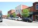 Charming street featuring vintage shops, brick buildings, and a variety of local businesses along a tree-lined avenue at 3827 Heritage Spring Circle Cir, Wake Forest, NC 27587