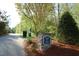Wake Forest Greenway System entrance with paved walking trail and well-maintained landscaping at 3827 Heritage Spring Circle Cir, Wake Forest, NC 27587