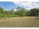 Large backyard featuring a seating area at 3901 Bluffwind Dr, Raleigh, NC 27603