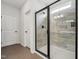 Contemporary bathroom with a glass-enclosed shower and sleek finishes at 3901 Bluffwind Dr, Raleigh, NC 27603
