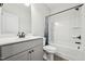 Well-lit bathroom featuring modern fixtures, a vanity, and a shower-tub combination at 3901 Bluffwind Dr, Raleigh, NC 27603