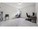 Bright and spacious bedroom with carpeted flooring, ideal for work or relaxation at 3901 Bluffwind Dr, Raleigh, NC 27603