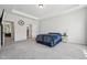 Comfortable main bedroom with a tray ceiling, perfect for rest and relaxation at 3901 Bluffwind Dr, Raleigh, NC 27603