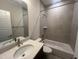 Modern bathroom with shower-tub combination and stylish vanity at 40 Wabash St, Pittsboro, NC 27312