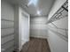 Walk-in closet with wire shelving provides ample storage space at 40 Wabash St, Pittsboro, NC 27312
