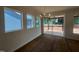 Bright dining area with large windows and sliding glass doors at 40 Wabash St, Pittsboro, NC 27312