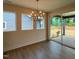Bright dining room with wood floors and a sliding glass door leading to the outdoors at 40 Wabash St, Pittsboro, NC 27312