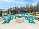 Inviting outdoor fire pit area with Adirondack chairs, perfect for gatherings at 40 Wabash St, Pittsboro, NC 27312